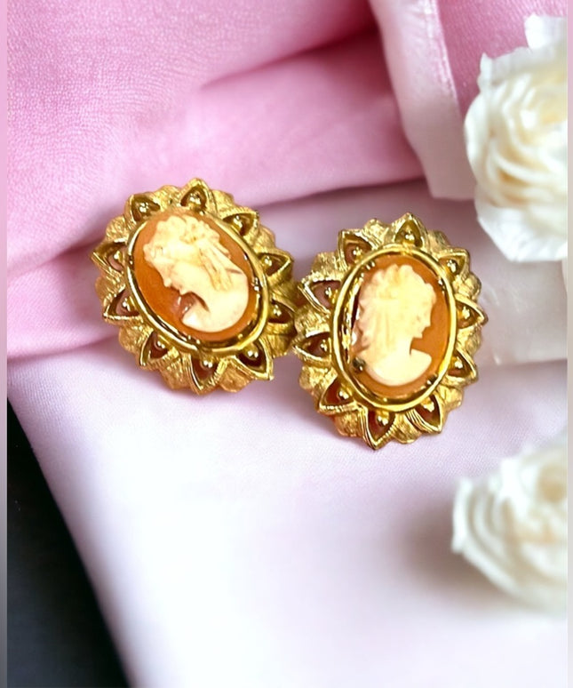 Vintage 1960s Fancy ornate gold finish resin cameo clip on earrings