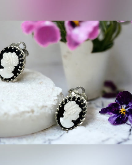 Vintage Cameo clip on earrings silver finish black & white silouette resin