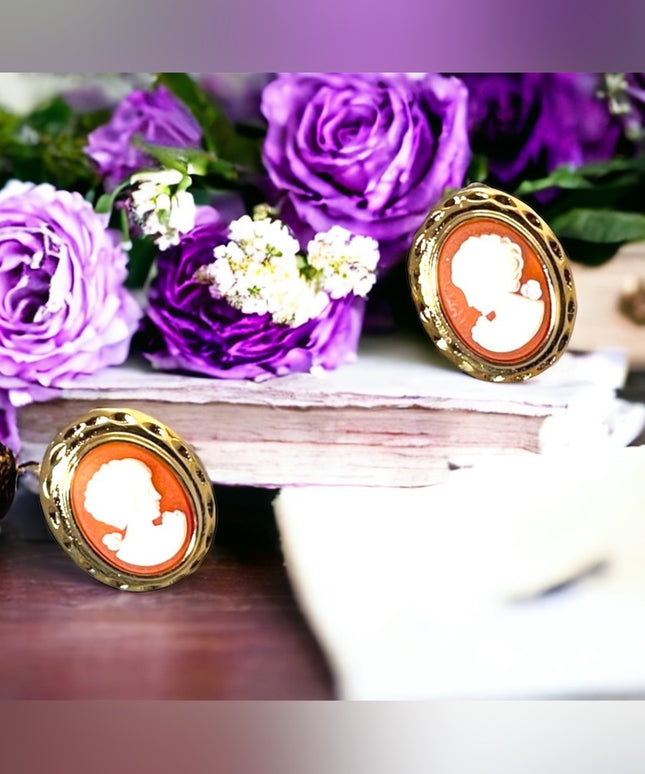 1980s gold finish high fashion faux resin cameo pierced earrings