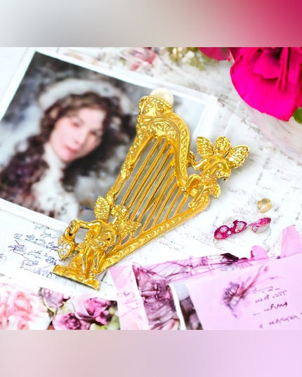 Vintage 1980s gold Irish angel cherub harp brooch large