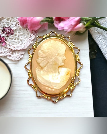 Vintage 1960s gold finish fancy bezel resin cameo brooch