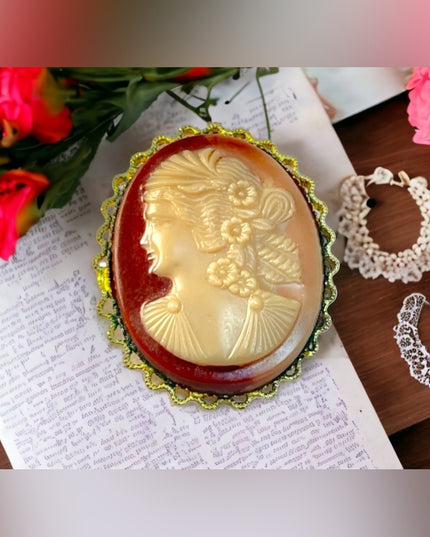 Antique oranate gold finish Celluloid cameo brooch