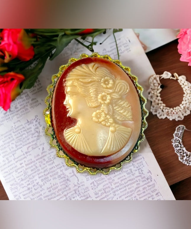 Antique oranate gold finish Celluloid cameo brooch