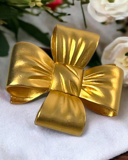 Large Heavy gold finish metal BOW brooch Etienne Aigner