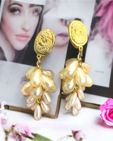 Vintage 1980s cameo gold finish faux pearl dangle earrings clip on