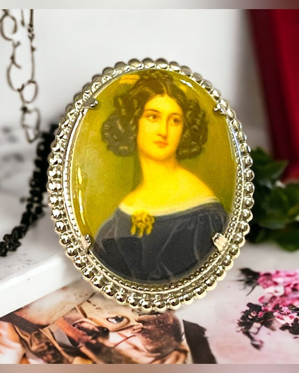 Vintage resin transfer silver finish cameo brooch oval
