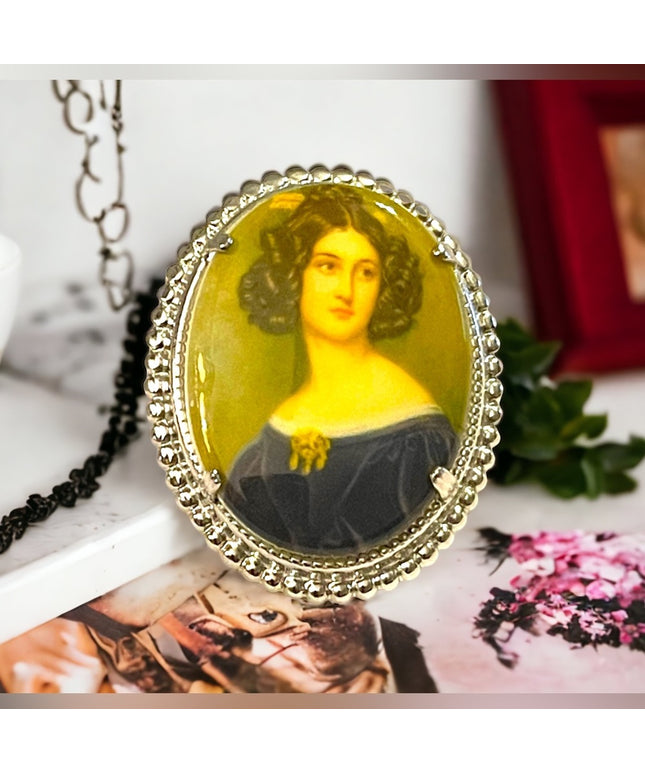 Vintage resin transfer silver finish cameo brooch oval