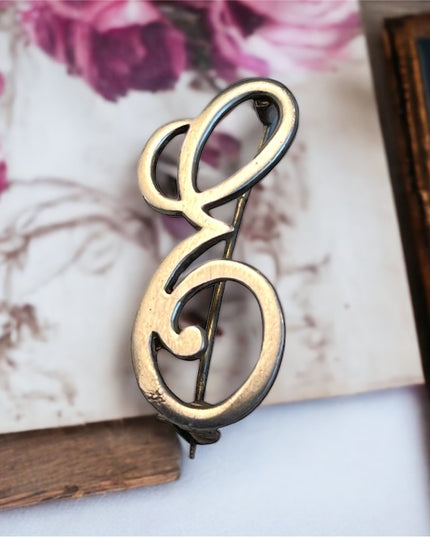 Vintage sterling silver E brooch