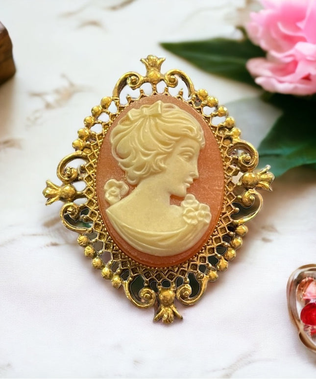 Vintage Avon Perfume resin cameo brooch opens for locket or perfume