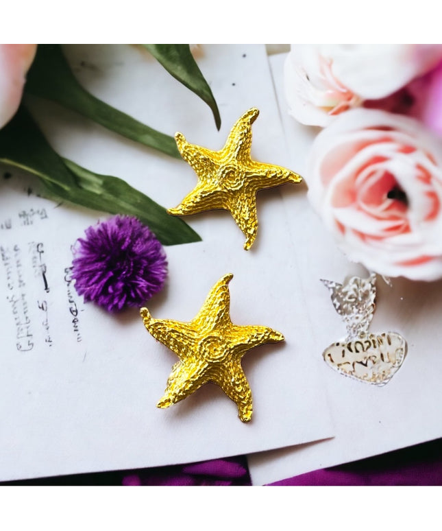 Gold finish Trifari Vintage fancy glam starfish clip on earrings