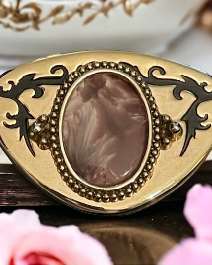 Vintage gold tone metal with ornate purple lucite Western belt buckle