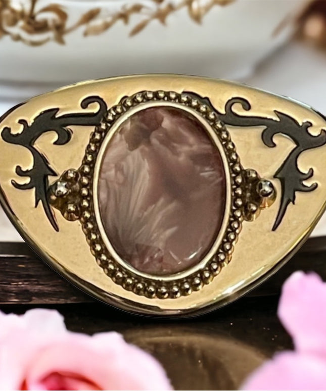 Vintage gold tone metal with ornate purple lucite Western belt buckle