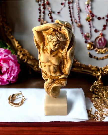 Vintage stone statue sculpture Dionysis on Marble