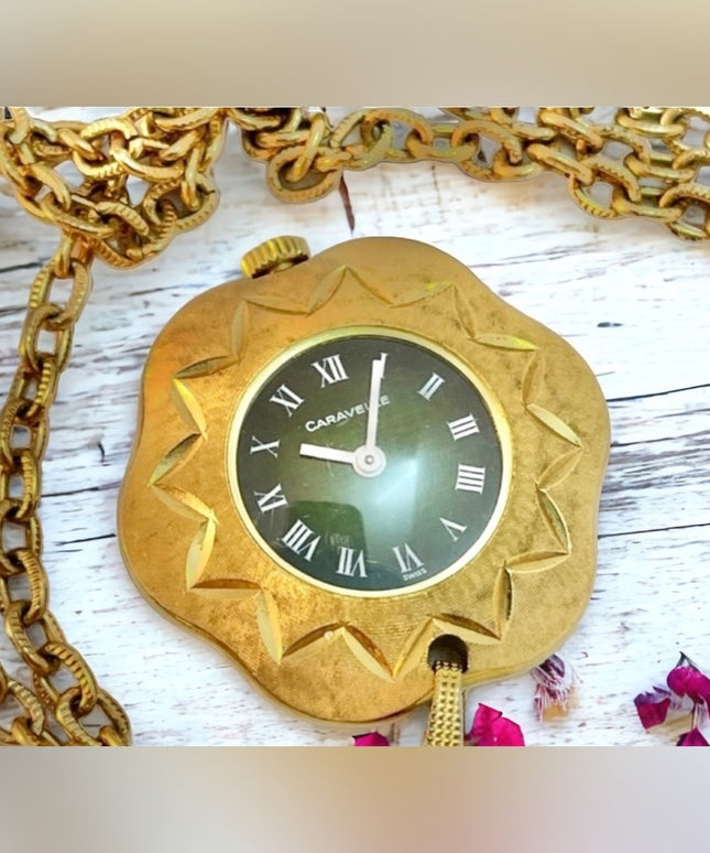 - Vintage eound ornate gold  high finish Caravelle Necklace watch Wind up