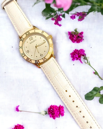 - Vintage 1980s Gruen Large white enamel face gold leather band quartz Wat…
