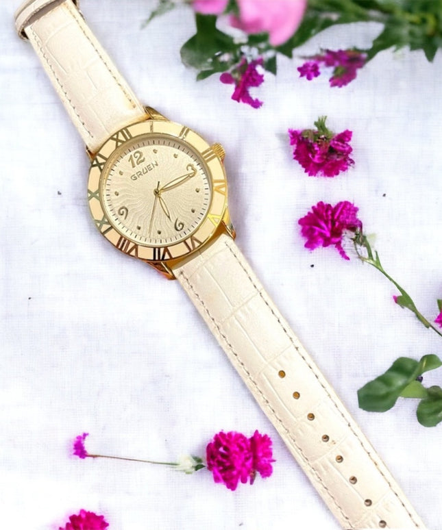 - Vintage 1980s Gruen Large white enamel face gold leather band quartz Wat…