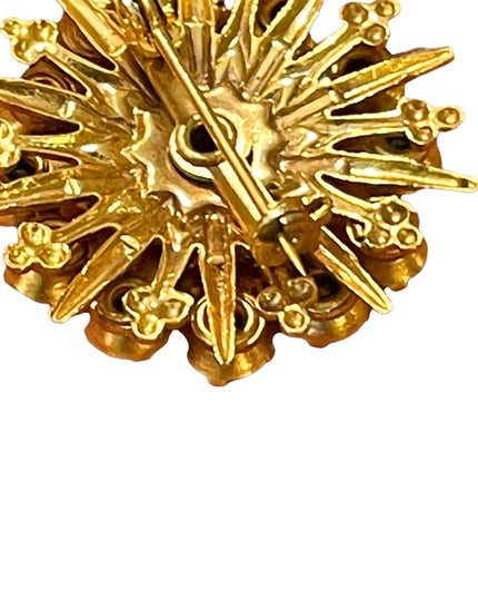 - Vintage blue clear crystal gold starburst brooch