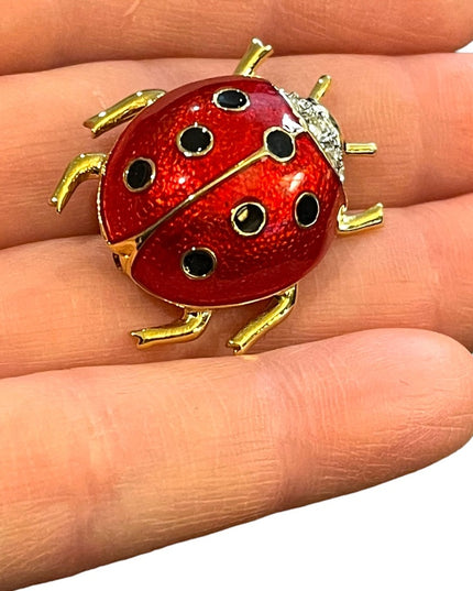 Vintage 1990s Dorlan crystal enameled lady bug brooch gold finish