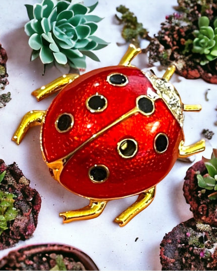 Vintage 1990s Dorlan crystal enameled lady bug brooch gold finish