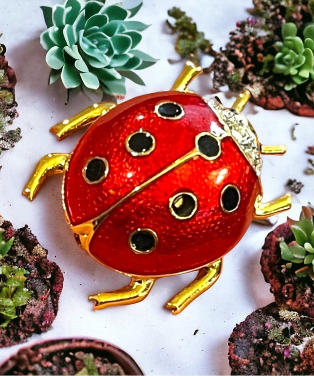 Vintage 1990s Dorlan crystal enameled lady bug brooch gold finish
