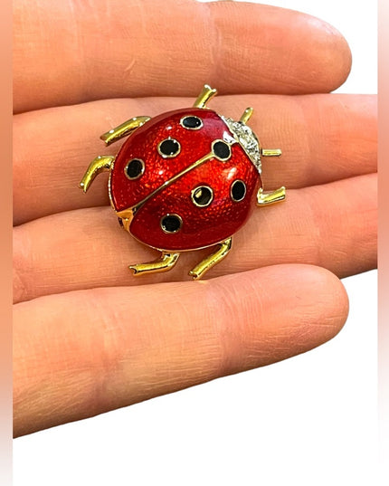 Vintage 1990s Dorlan crystal enameled lady bug brooch gold finish