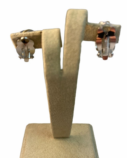 - c1980 Nina Ricci Gold silver tone clip earrings