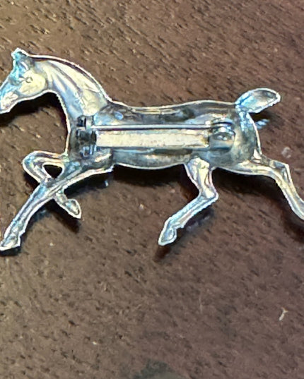 Vintage Sterling silver galloping horse brooch