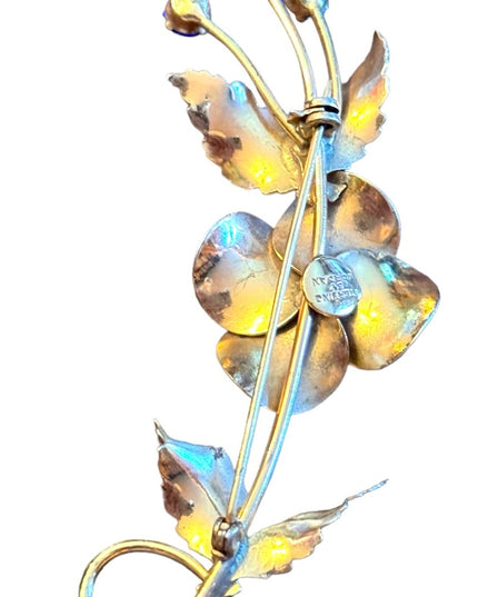 Vintage gold plt sterling silver by Jordann Fancy flower brooch  blue crystals