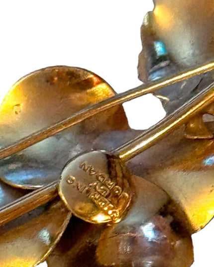 Vintage gold plt sterling silver by Jordann Fancy flower brooch  blue crystals