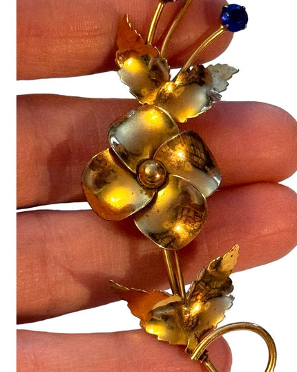 Vintage gold plt sterling silver by Jordann Fancy flower brooch  blue crystals