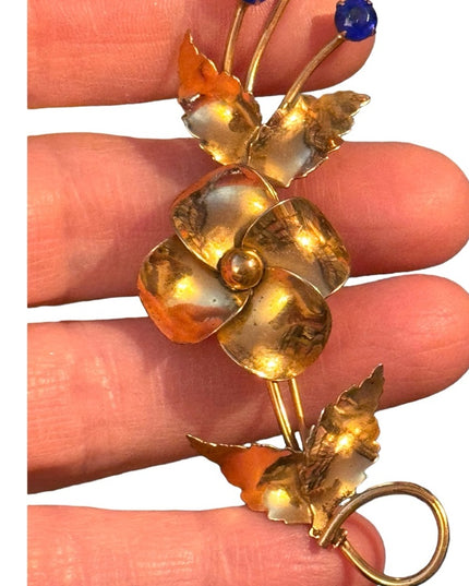 Vintage gold plt sterling silver by Jordann Fancy flower brooch  blue crystals