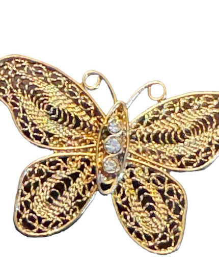 Vintage gold finish fancy filagree butterfly brooch with crystal embellishment