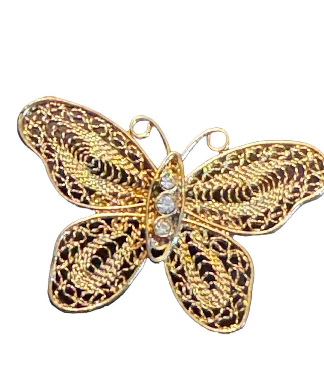 Vintage gold finish fancy filagree butterfly brooch with crystal embellishment