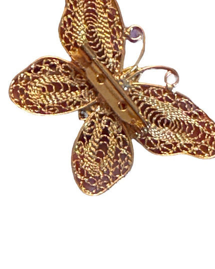 Vintage gold finish fancy filagree butterfly brooch with crystal embellishment