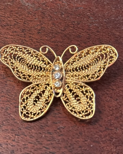 Vintage gold finish fancy filagree butterfly brooch with crystal embellishment
