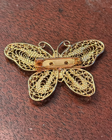 Vintage gold finish fancy filagree butterfly brooch with crystal embellishment