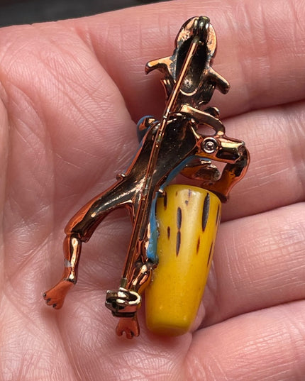 Vintage Bakelite drummer copper finish enameld brooch Charles Worth book piece
