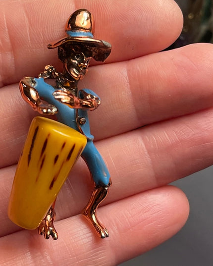 Vintage Bakelite drummer copper finish enameld brooch Charles Worth book piece