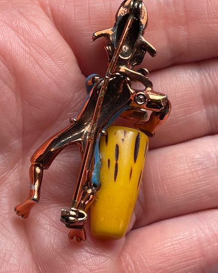 Vintage Bakelite drummer copper finish enameld brooch Charles Worth book piece