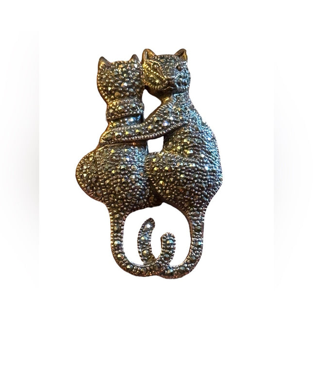 Vintage sterling silver marcasite antiqued cat hugging  brooch