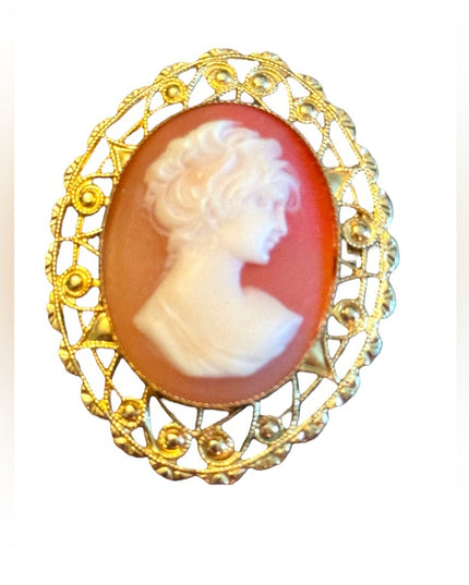 Lovely gold finish filagree bezel vintage resin cameo brooch