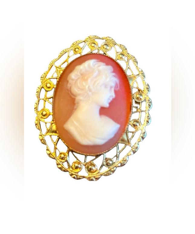 Lovely gold finish filagree bezel vintage resin cameo brooch
