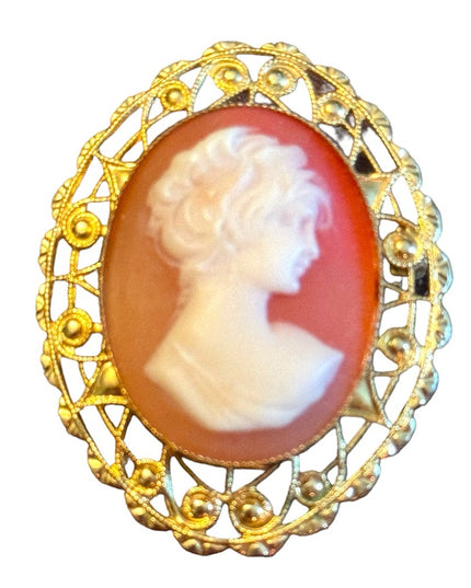 Lovely gold finish filagree bezel vintage resin cameo brooch