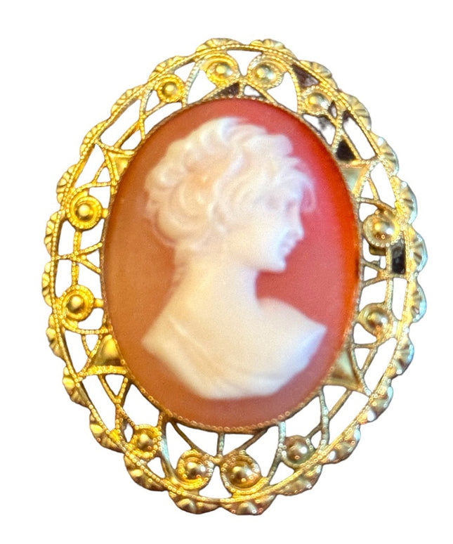 Lovely gold finish filagree bezel vintage resin cameo brooch