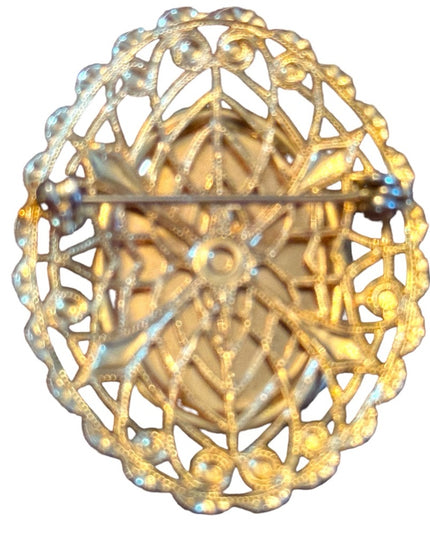Lovely gold finish filagree bezel vintage resin cameo brooch