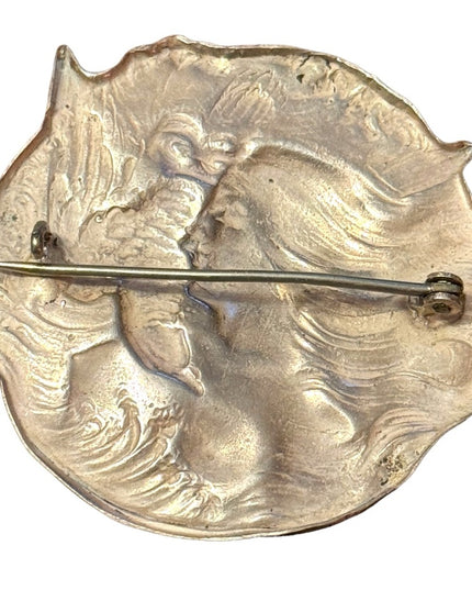 Vintage silver ornate etched finely detailed huntress with a swallow bird brooch