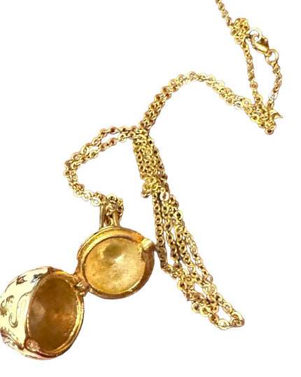 Gold finish creamy enameld crystal embellished Faberge style egg locket necklace