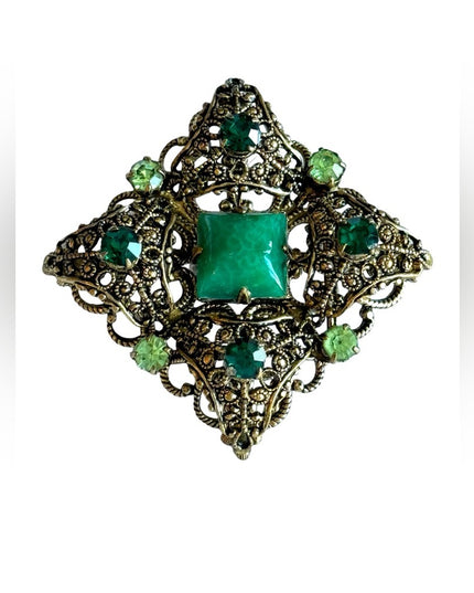 Vintage antiqued green glass crystal fancy filagree brooch