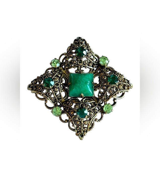 Vintage antiqued green glass crystal fancy filagree brooch