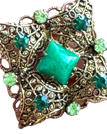 Vintage antiqued green glass crystal fancy filagree brooch